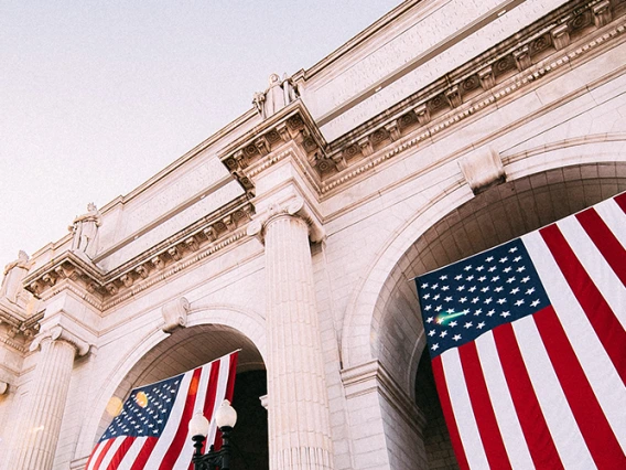 American flag hanging on building in D.C.