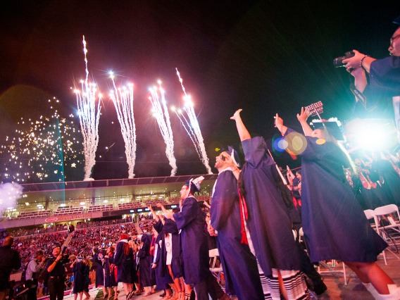 students celebrating at commencement