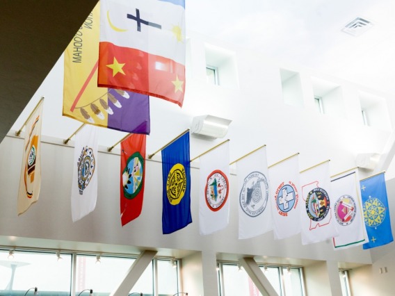 An exhibit at the Arizona BookStore at the Student Union Memorial Center features the flags of Arizona's 22 tribal nations.