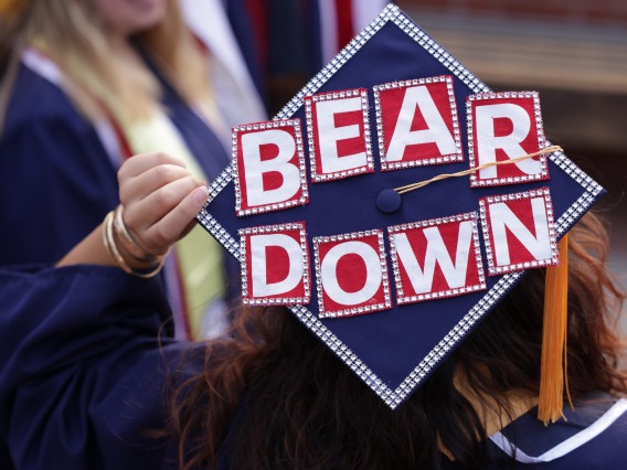 mortarboard at May 2022 commencement reading "BearDown"