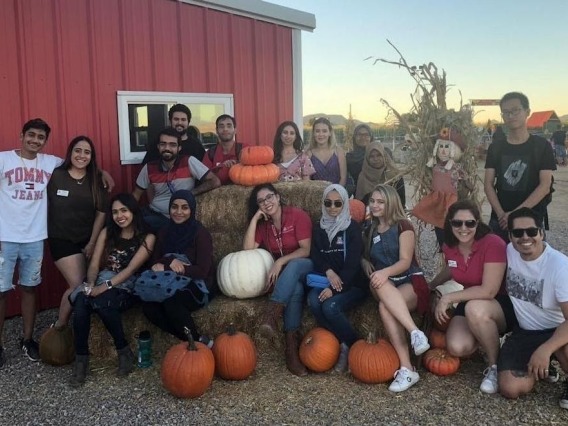 A past group of Global Ambassadors and members of the Buddy Program took a trip to the Buckelew Farms Pumpkin Patch.