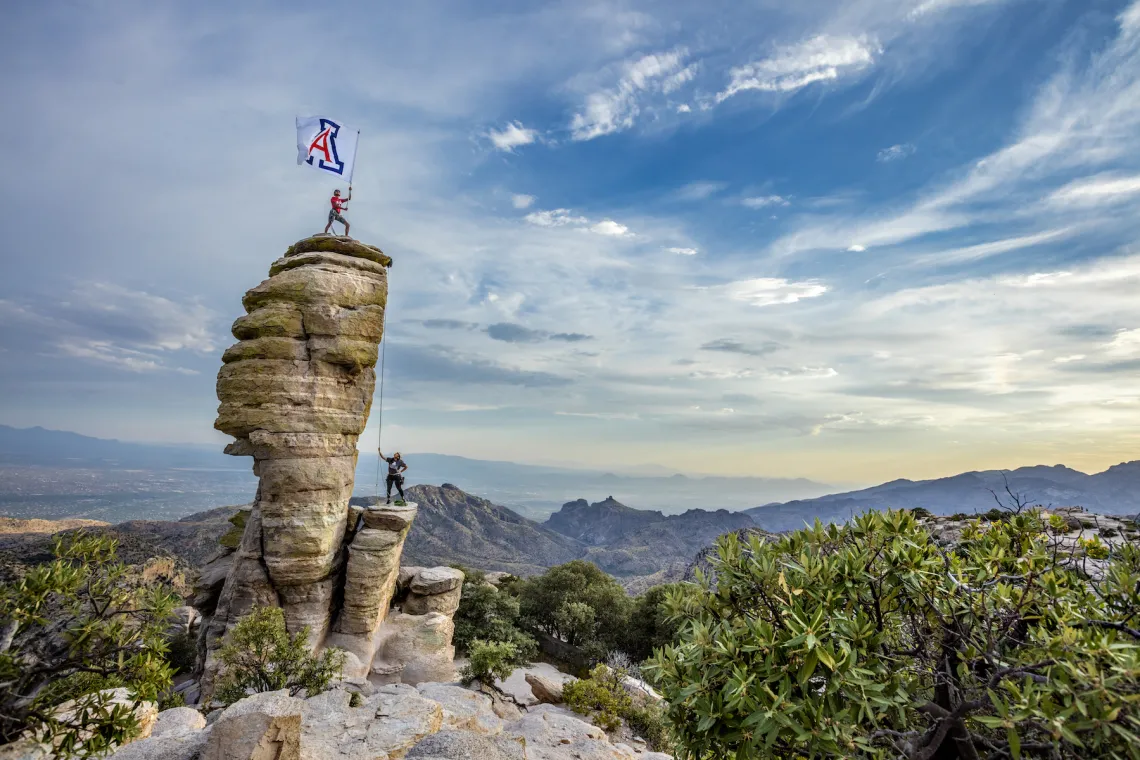 University of Arizona flag held atop Windy Point Vista